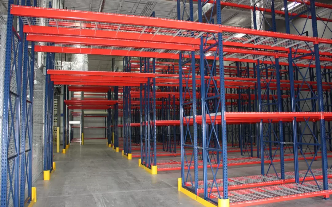 Pallet racking loaded with cartons in a warehouse aisle
